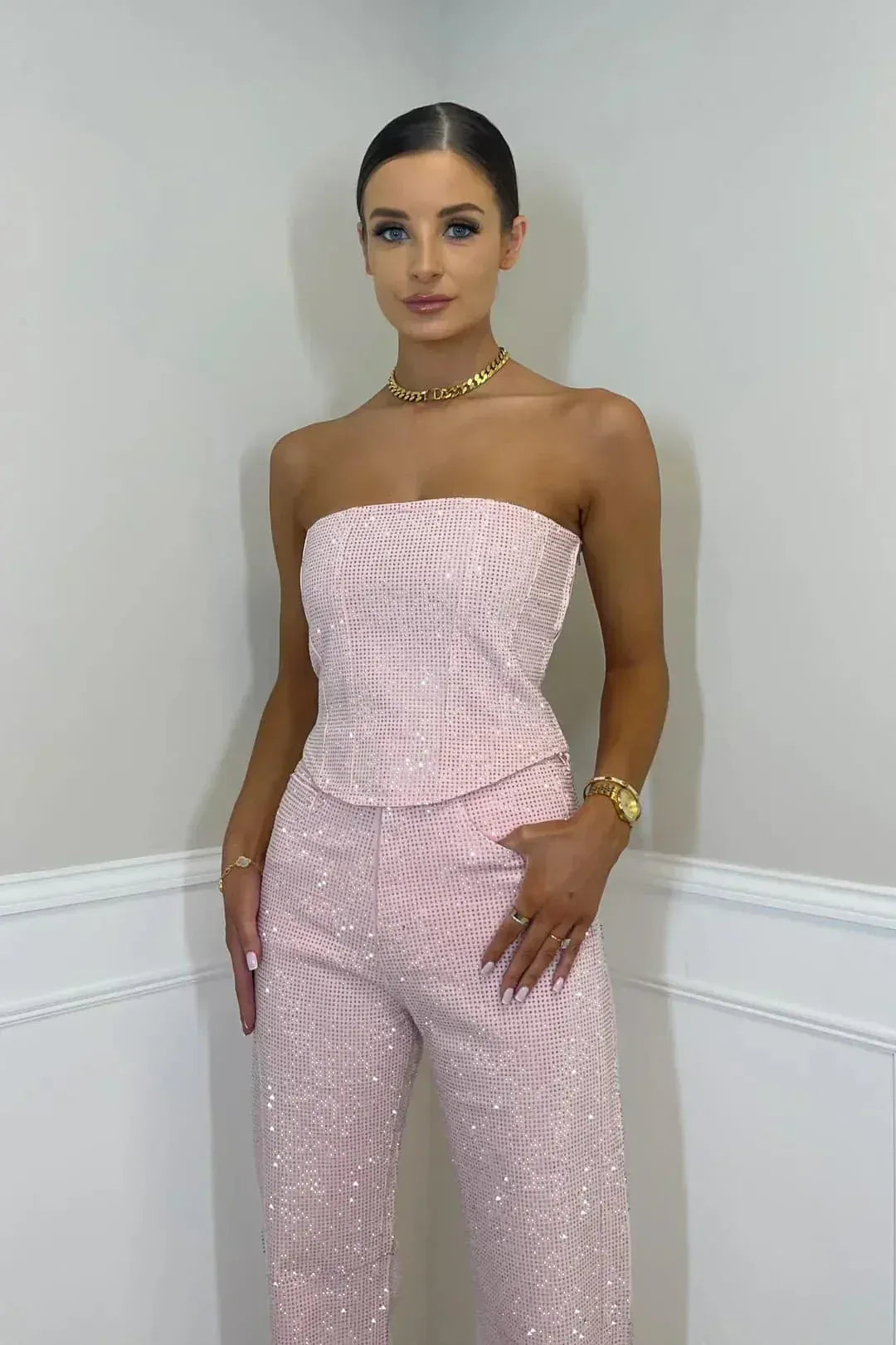 Completo elegante da donna con paillettes, top strapless e pantalone a vita alta, due pezzi da sera - foto 11