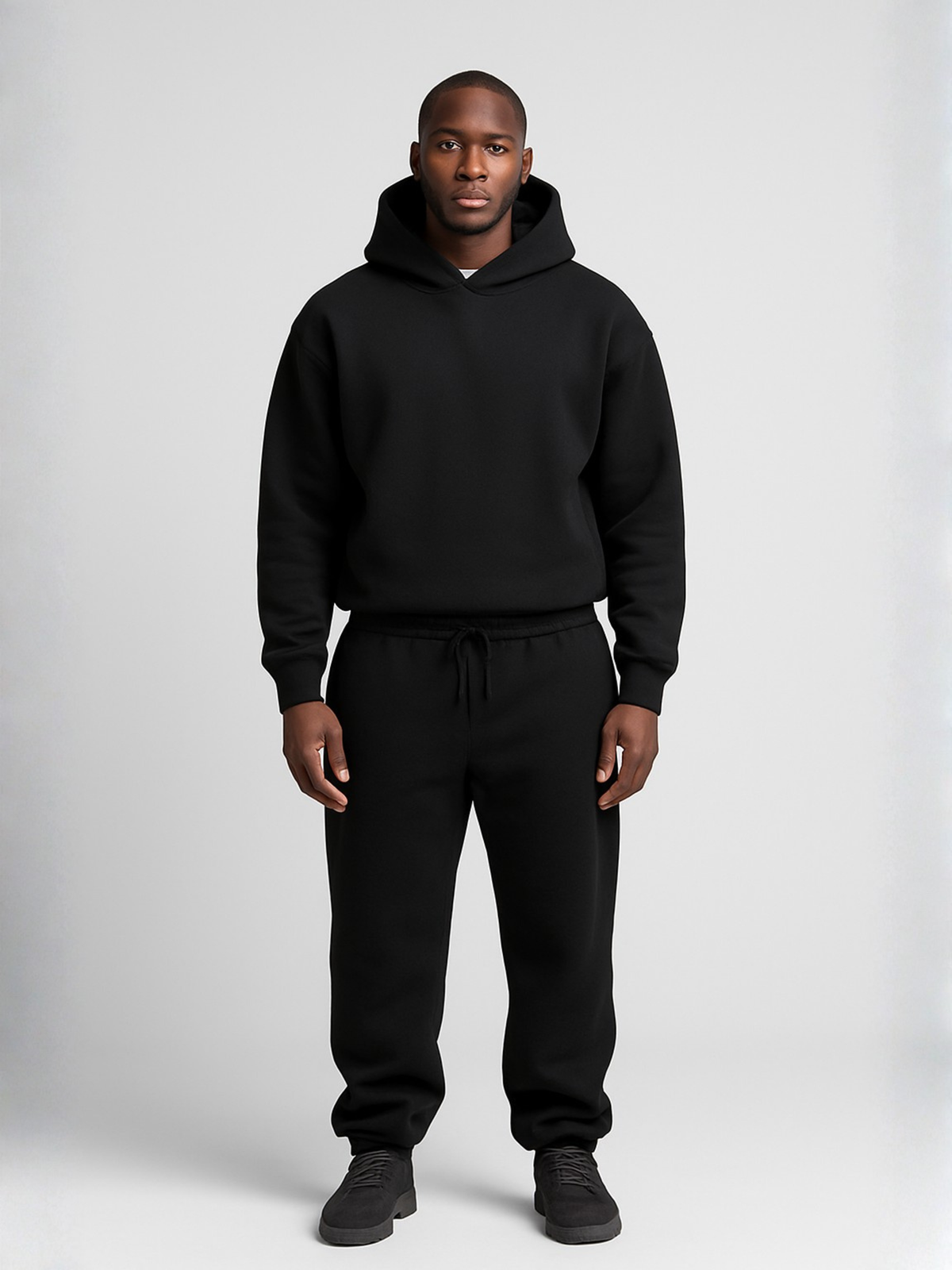 Tuta uomo completa oversize con cappuccio, felpa e pantaloni, casual - Nero